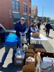 Florence Bank employees assembling food